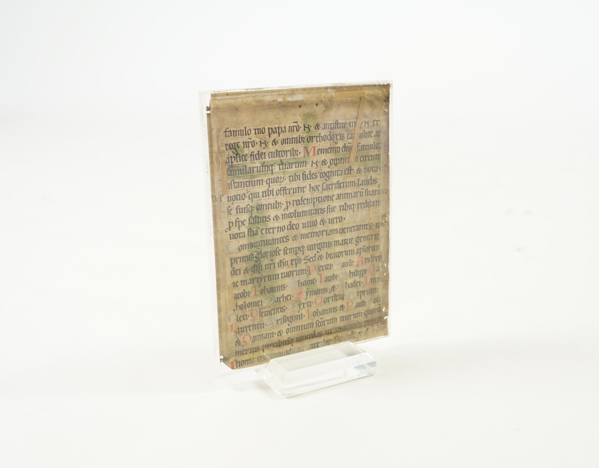 An illuminated leaf from a missal at the Canon, with Crucifixion scene, the reverse inscribed with the Te igitur, probably Austria or South German, second half 12th century